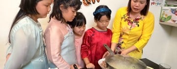越南煎餅香遇優雅奧黛 移民署以美食與文化向女性致敬